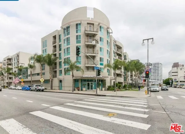 a tall building sitting on the side of a street