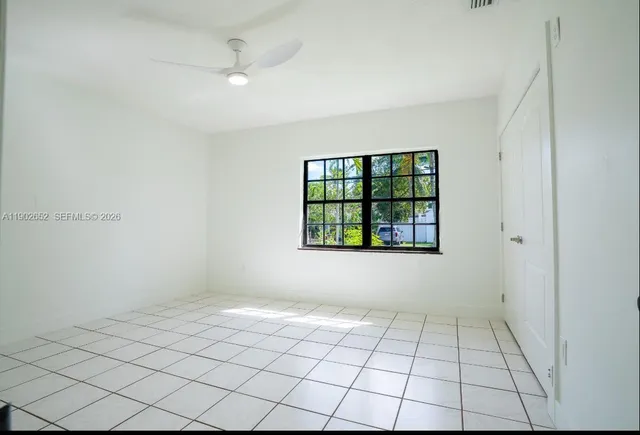 a view of a backyard of a house