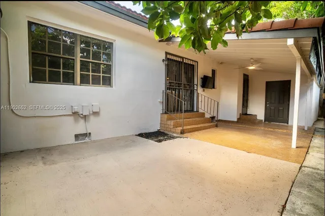 a view of a house with a garage