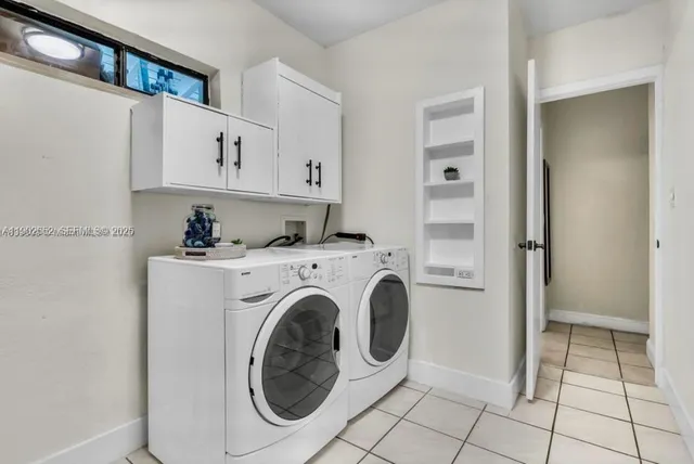 a view of kitchen with washer and dryer