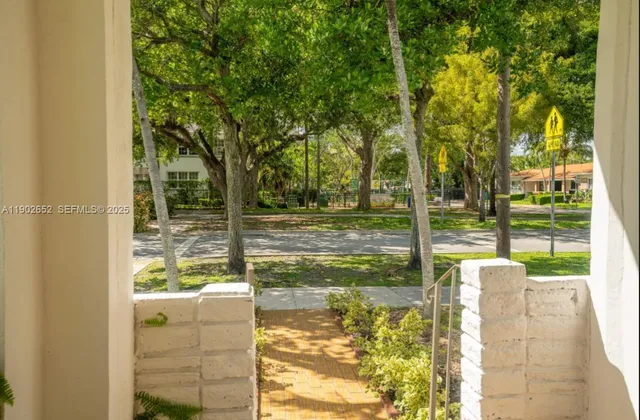 a view of swimming pool with a patio