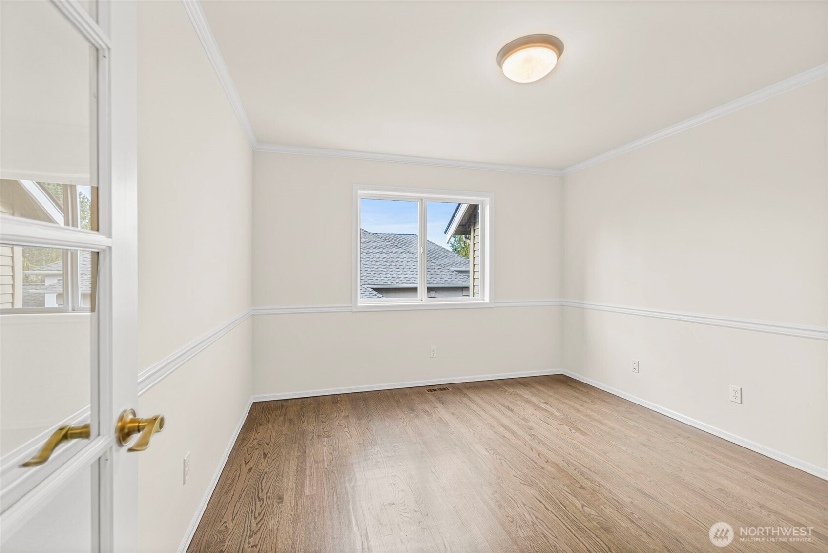 2018 242nd Street Southeast Bothell, WA 98021 - Photo 11 of 26 an empty room with a empty space and a window