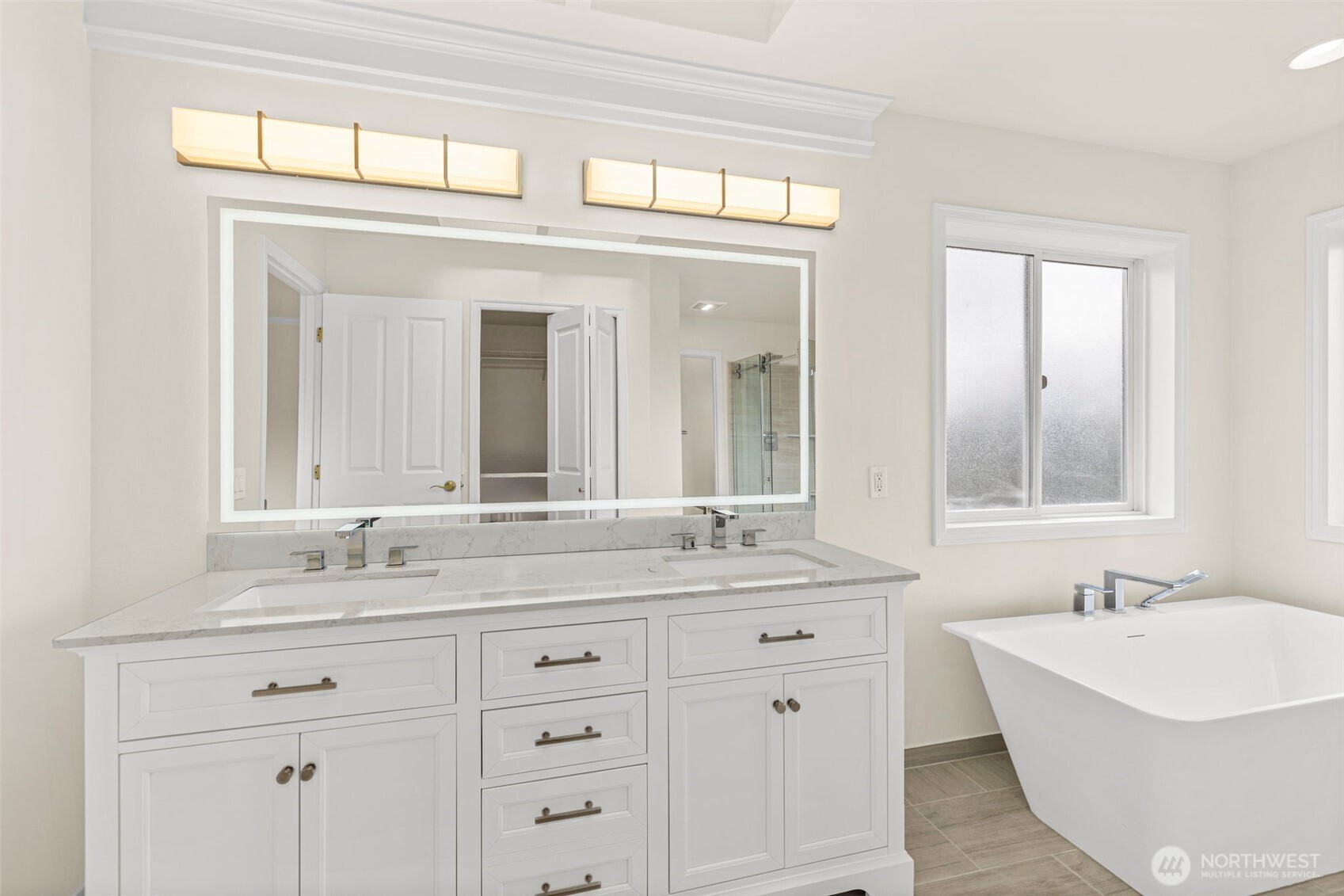 2018 242nd Street Southeast Bothell, WA 98021 - Photo 15 of 26 a bathroom with a sink double vanity and a mirror