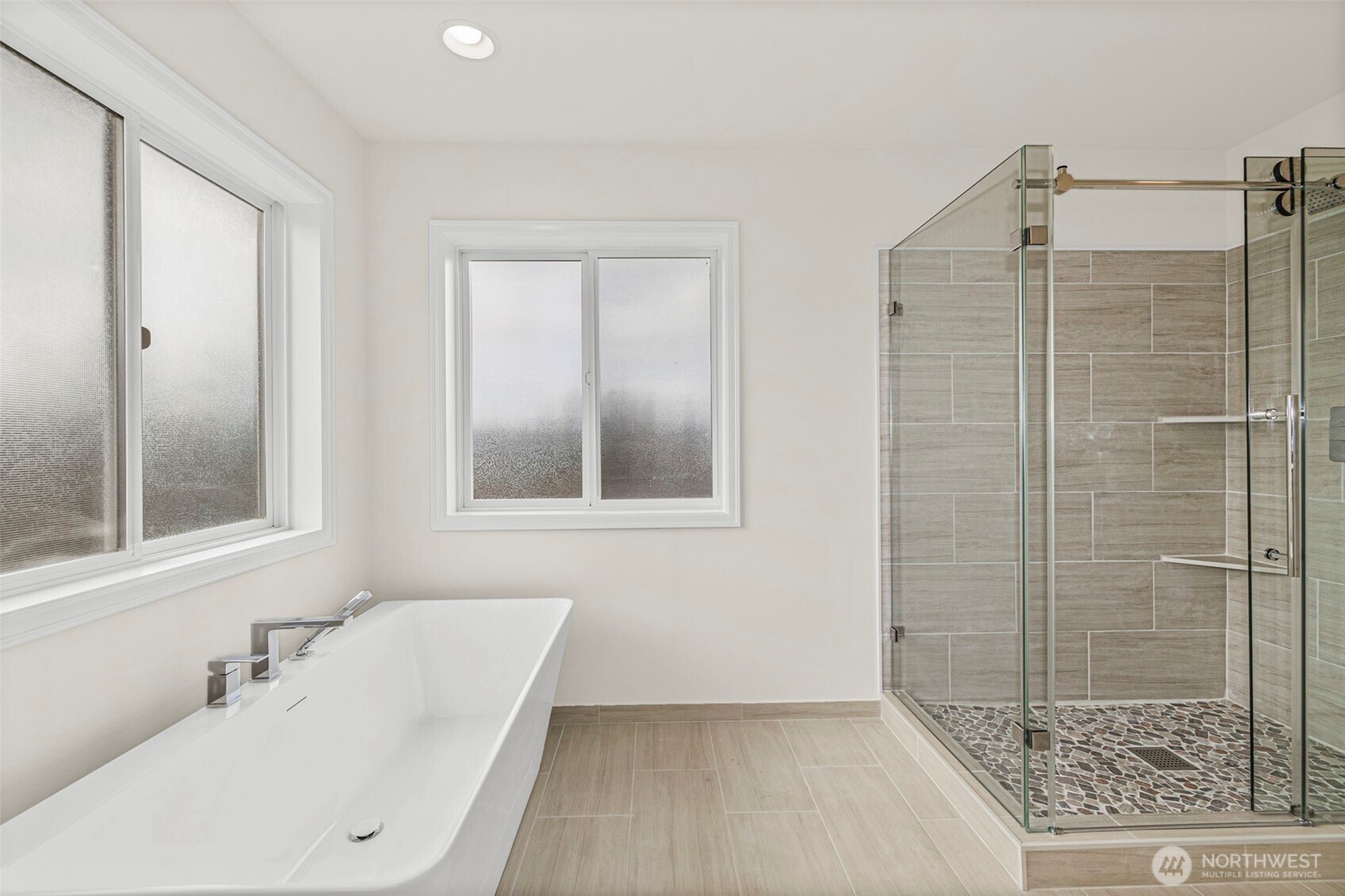 2018 242nd Street Southeast Bothell, WA 98021 - Photo 16 of 26 a bathroom with a sink a toilet and shower
