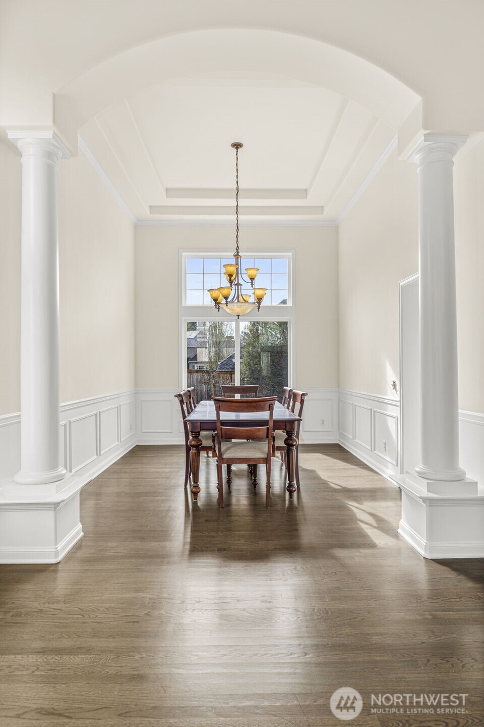 2018 242nd Street Southeast Bothell, WA 98021 - Photo 6 of 26 a dining room with furniture window and wooden floor