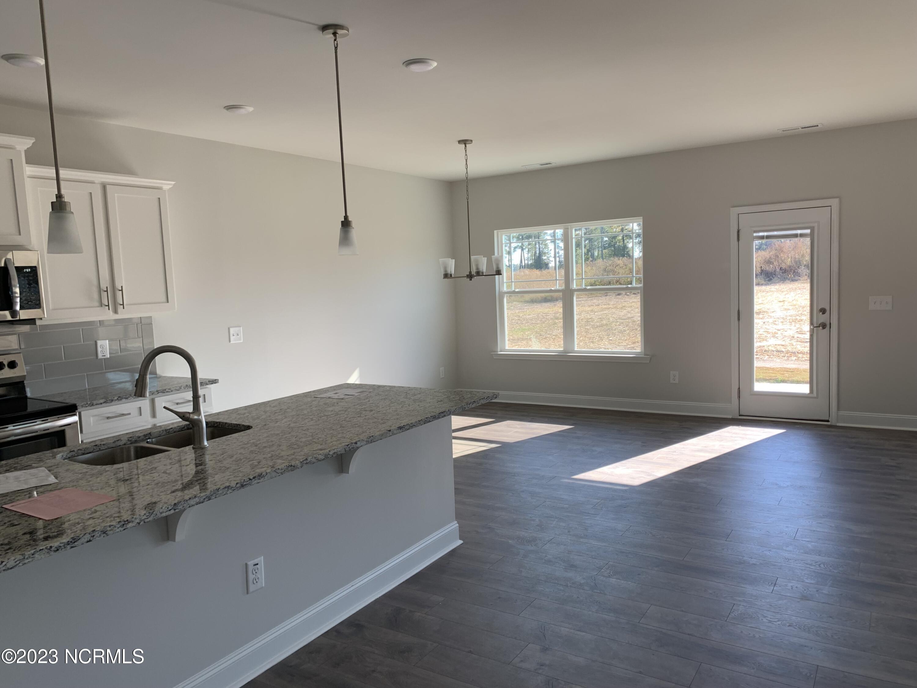 8548 Shallow Crk Trail, Unit 187 Bailey, NC 27807 - Photo 5 of 24 Kitchen Dining Area