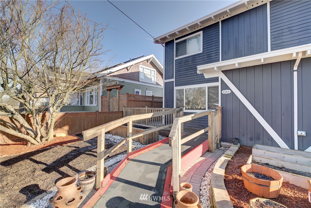 126 Pelly Avenue North, Unit AB Renton, WA 98057 - Photo 16 of 23 a view of house with a ocean view