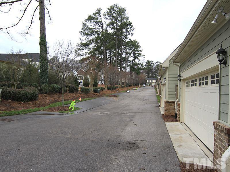 2305 Lowden Street Raleigh, NC 27608 - Photo 22 of 25 a view of road with large tree