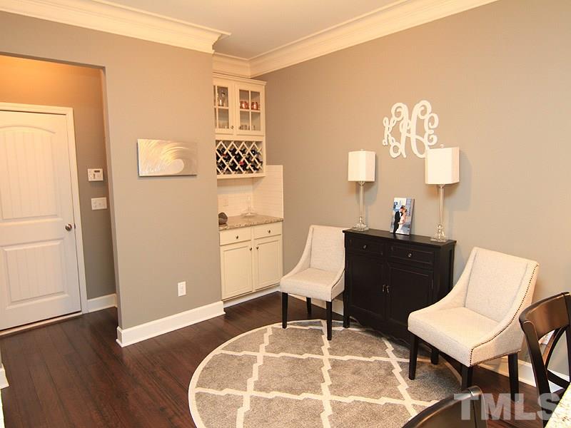 2305 Lowden Street Raleigh, NC 27608 - Photo 8 of 25 a workspace with furniture and wooden floor