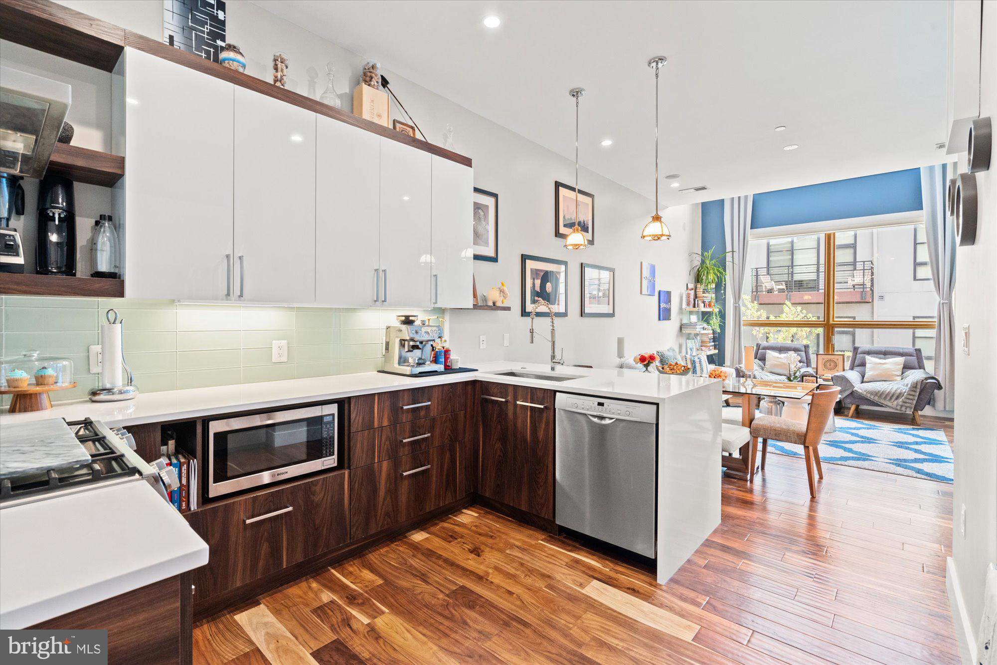Modern kitchen with warm wood accents.