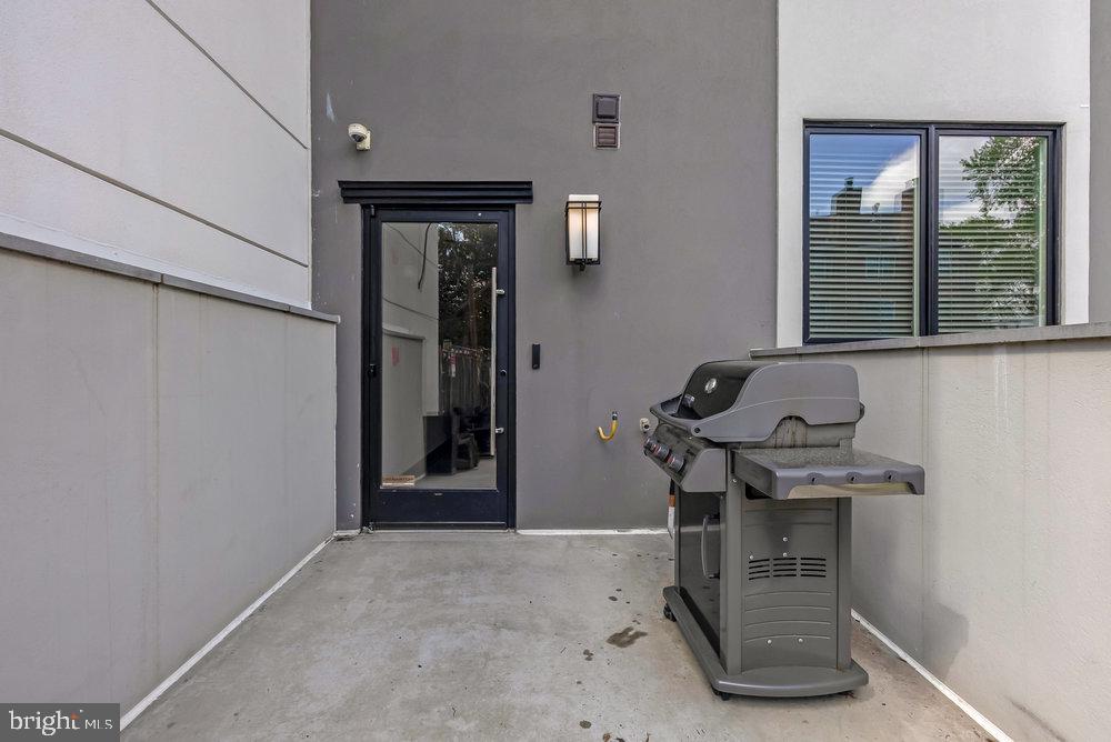 1337 K Street Southeast, Unit PH2 Washington, DC 20003 - Photo 20 of 22 Stylish entry with outdoor grilling space.