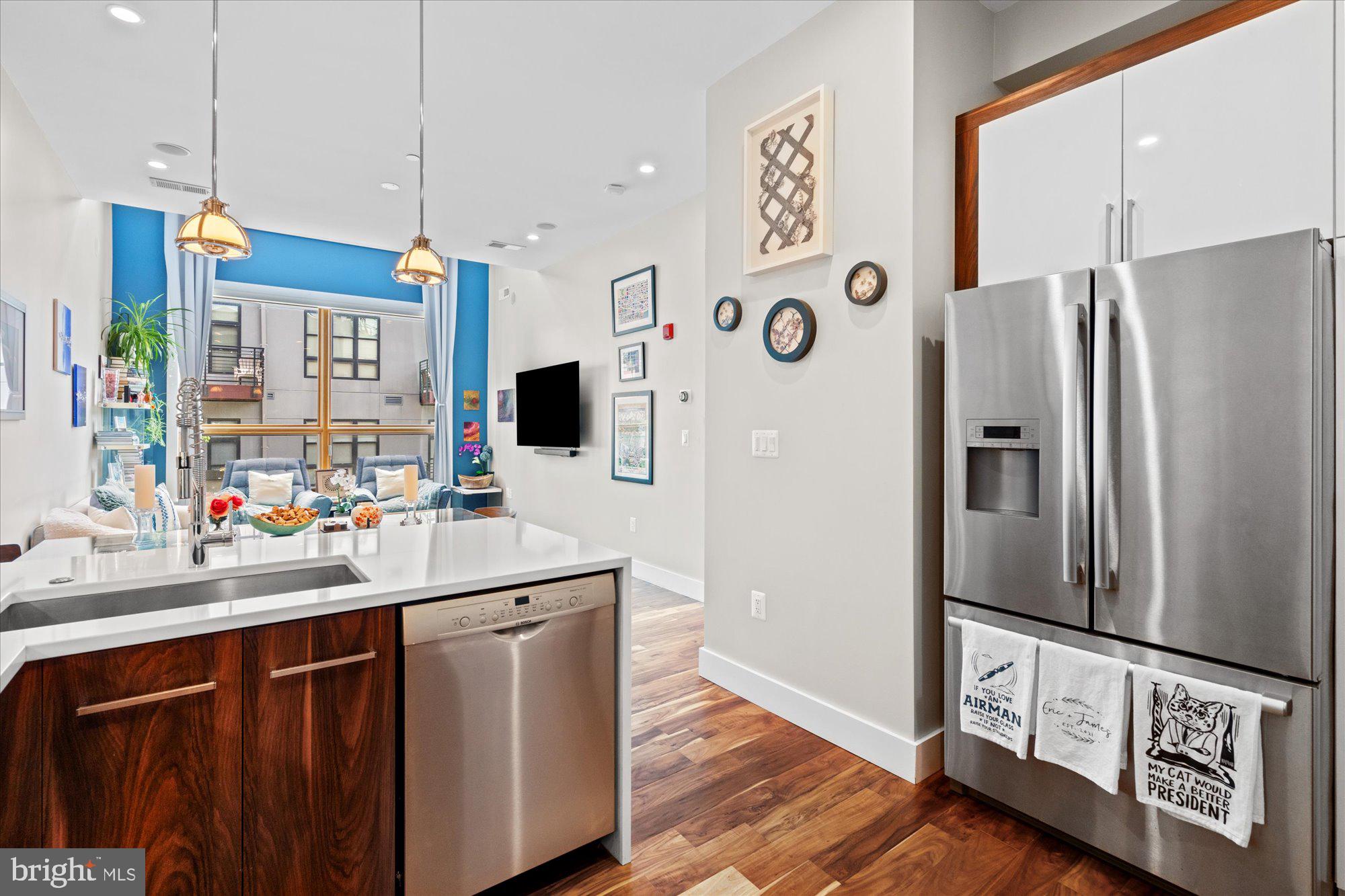 1337 K Street Southeast, Unit PH2 Washington, DC 20003 - Photo 2 of 22 Modern kitchen with vibrant accents.