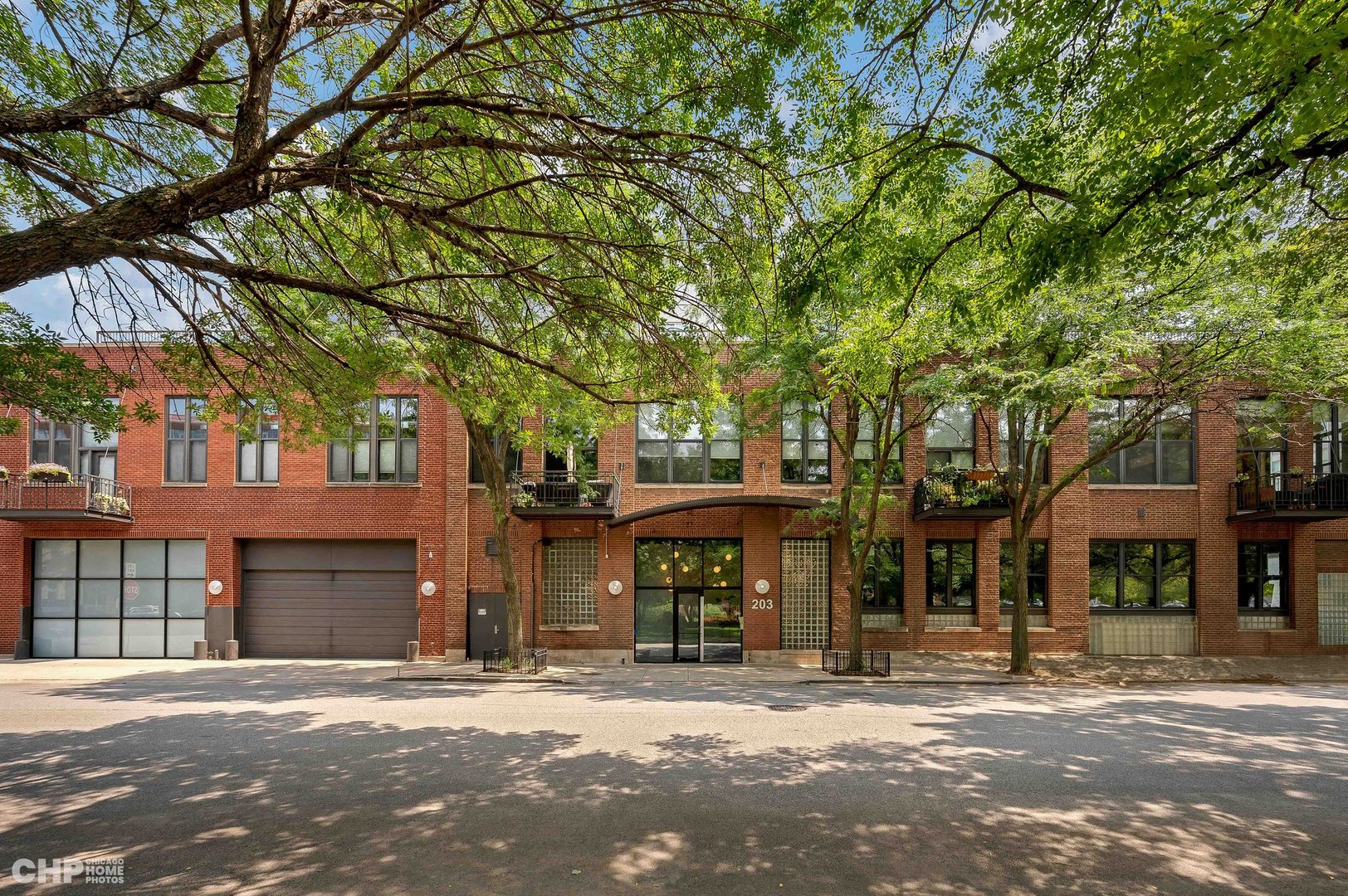 203 South Sangamon Street, Unit 206 Chicago, IL 60607 - Photo 1 of 20 a front view of a building