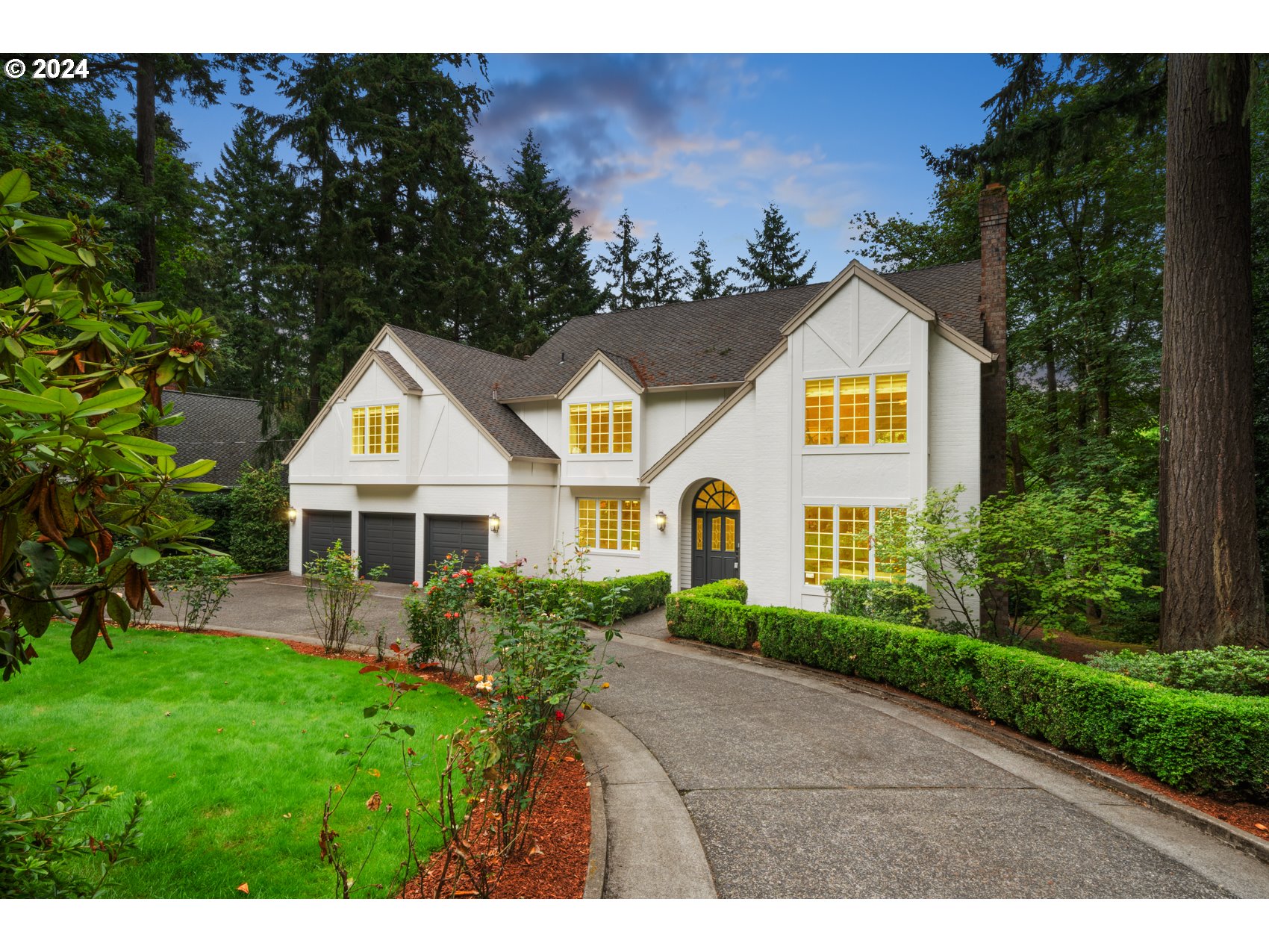 0843 South Palatine Hill Road Portland, OR 97219 - Photo 1 of 1 a front view of a house with a yard and potted plants
