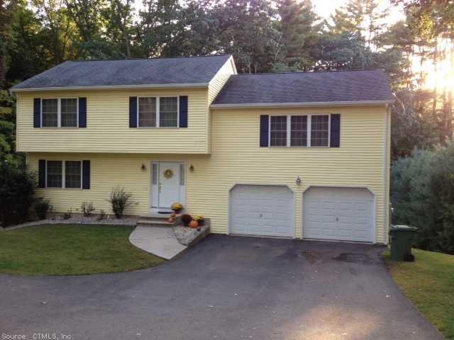 a view of a yard in front of a house