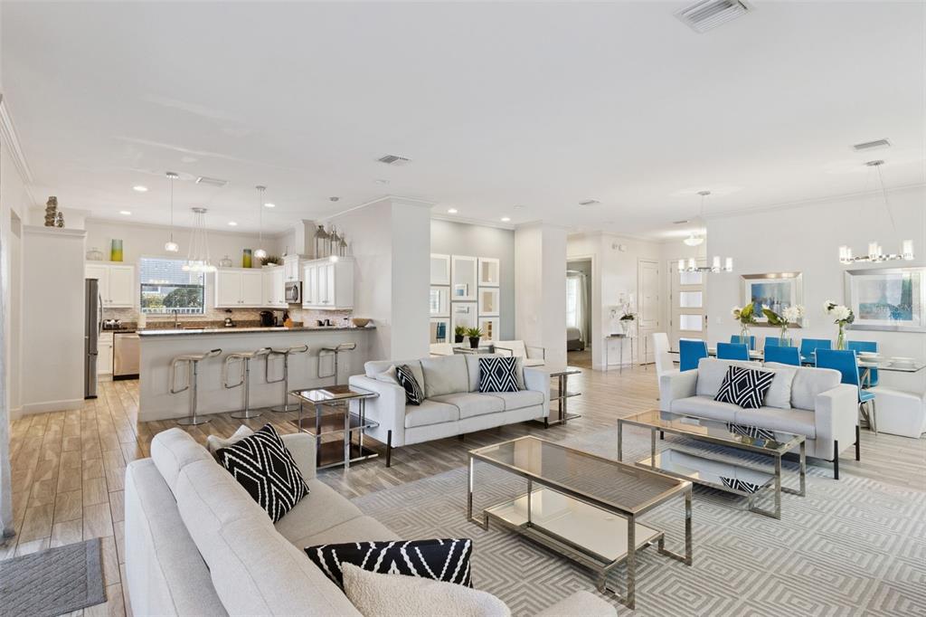 7423 Sparkling Court Reunion, FL 34747 - Photo 2 of 62 a living room with furniture kitchen view and a table