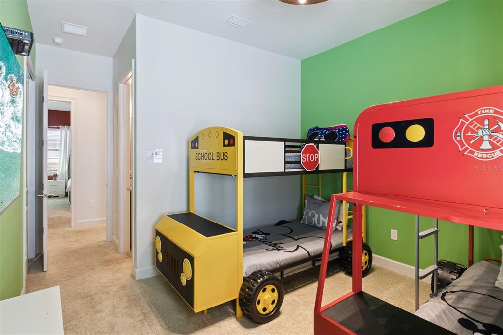 7423 Sparkling Court Reunion, FL 34747 - Photo 26 of 62 a room with furniture and a table