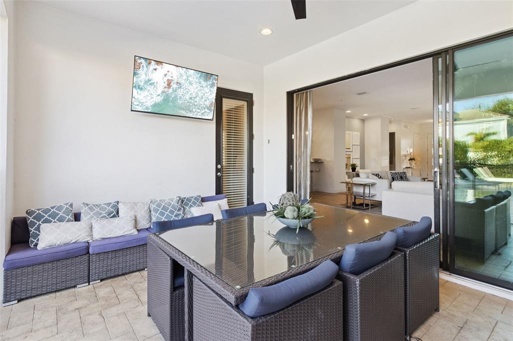 7423 Sparkling Court Reunion, FL 34747 - Photo 34 of 62 a dining room with a table and chairs