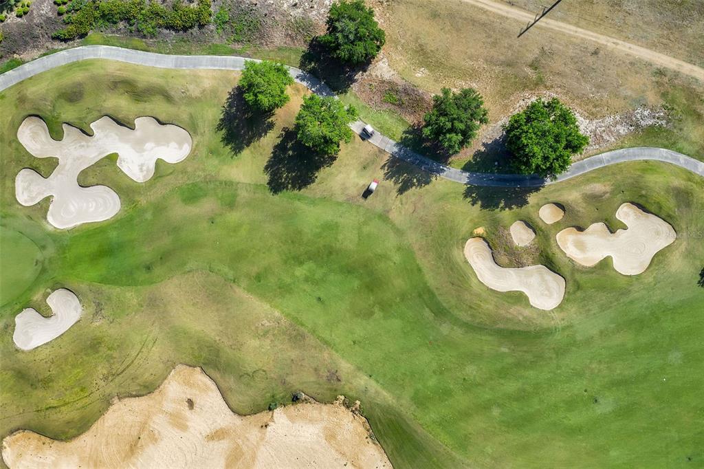7423 Sparkling Court Reunion, FL 34747 - Photo 43 of 62 a bathroom with a sink mirror and yard