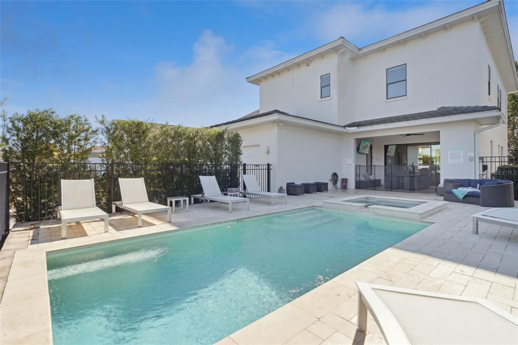 7423 Sparkling Court Reunion, FL 34747 - Photo 5 of 62 a view of a house with backyard porch and sitting area