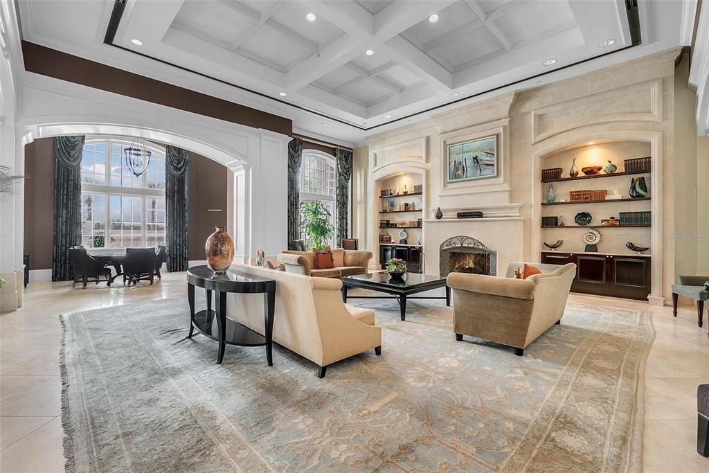 7423 Sparkling Court Reunion, FL 34747 - Photo 52 of 62 a living room with furniture and a fireplace