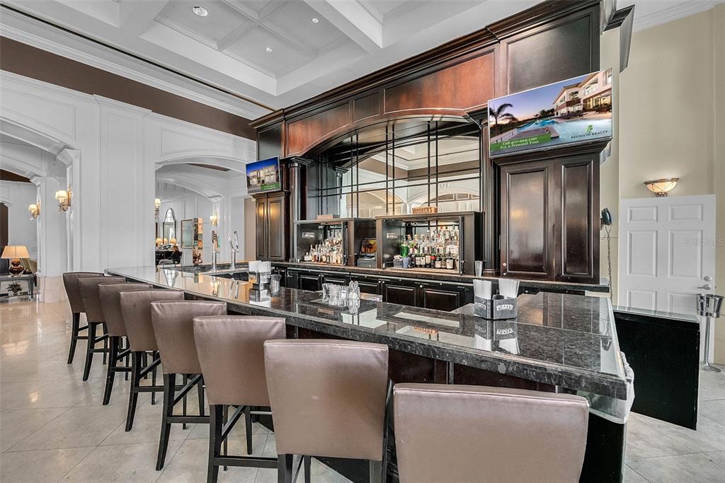 7423 Sparkling Court Reunion, FL 34747 - Photo 53 of 62 a kitchen with stainless steel appliances granite countertop a stove and a sink