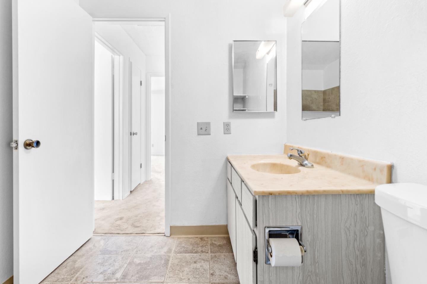 967 Hilby Avenue, Unit C Seaside, CA 93955 - Photo 14 of 24 a bathroom with a sink and a mirror