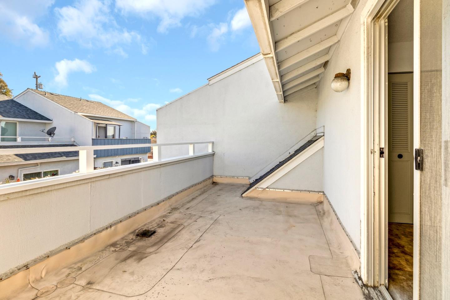 967 Hilby Avenue, Unit C Seaside, CA 93955 - Photo 19 of 24 a view of balcony and kitchen