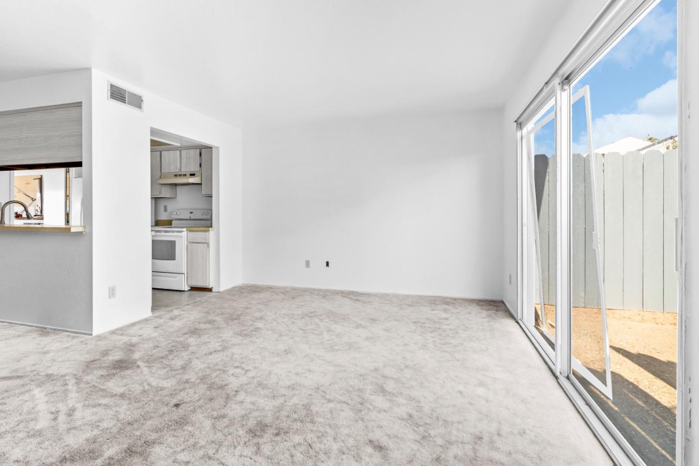 967 Hilby Avenue, Unit C Seaside, CA 93955 - Photo 8 of 24 an empty room with windows