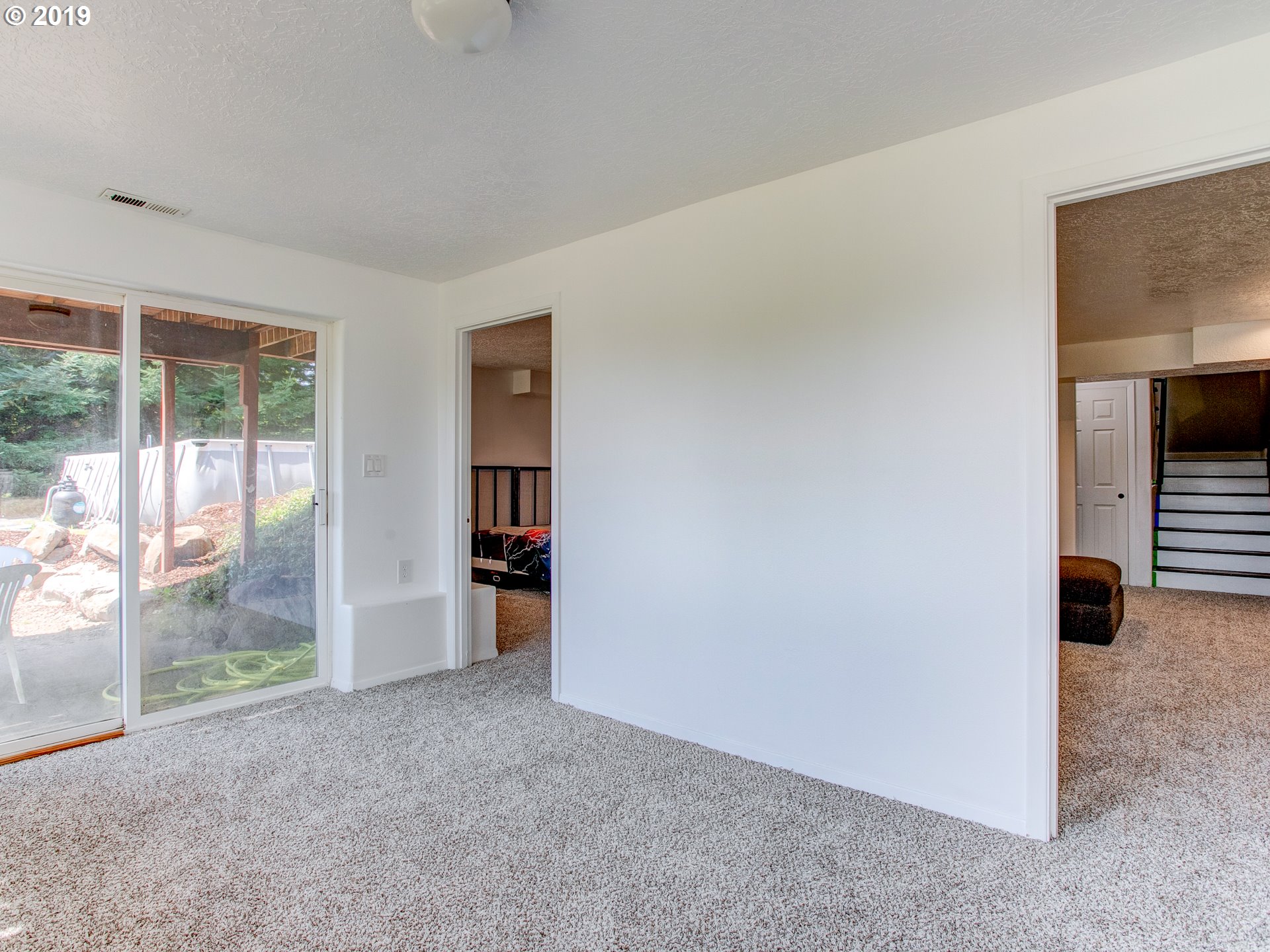 417 Northeast 299th Street Ridgefield, WA 98642 - Photo 32 of 32 a view of empty room with floor to ceiling window