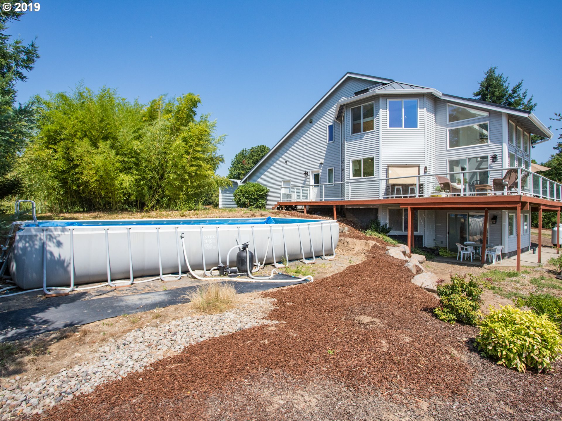 417 Northeast 299th Street Ridgefield, WA 98642 - Photo 4 of 32 a front view of a house with a yard