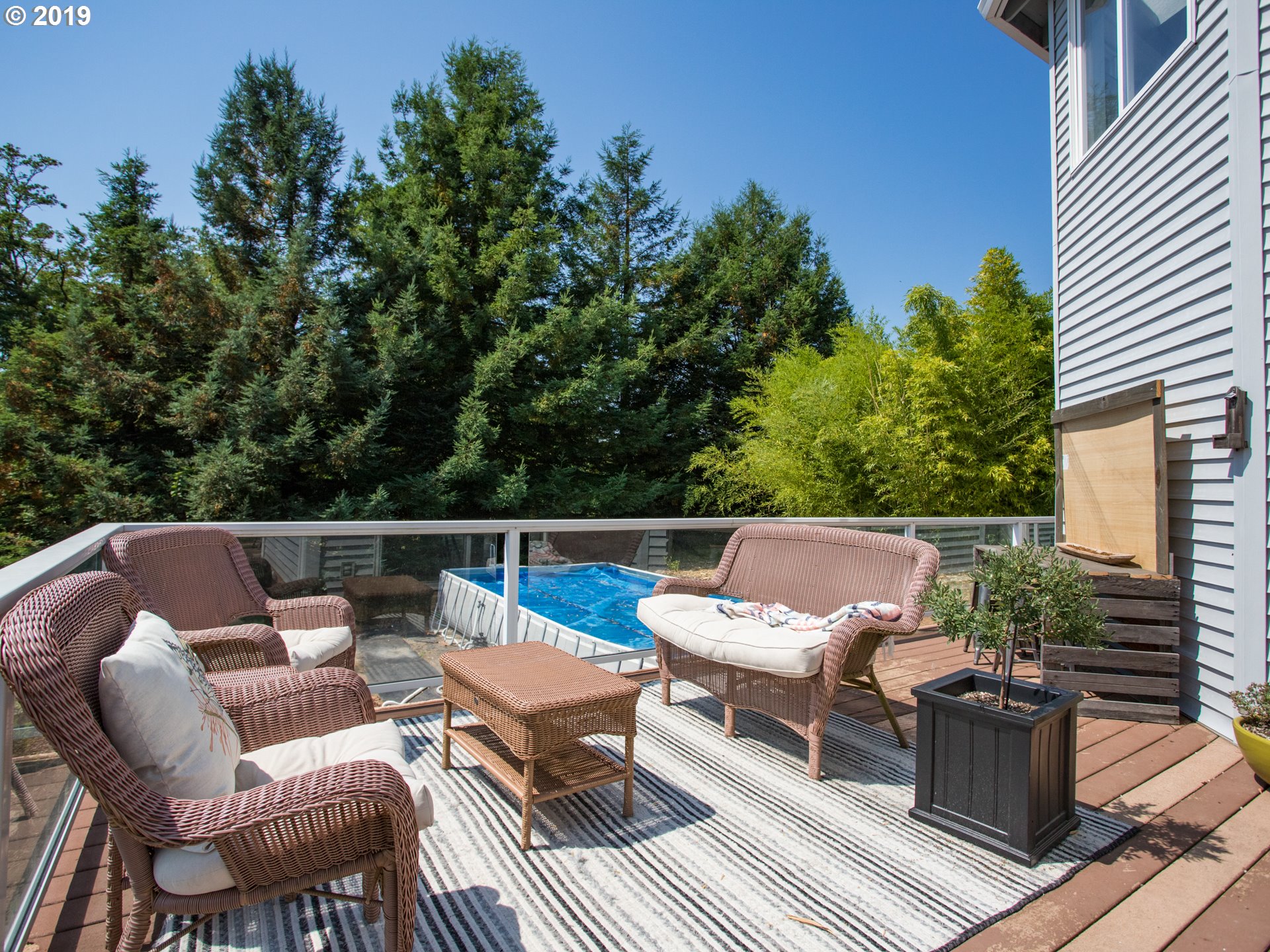 417 Northeast 299th Street Ridgefield, WA 98642 - Photo 5 of 32 a view of sitting area with furniture on wooden deck