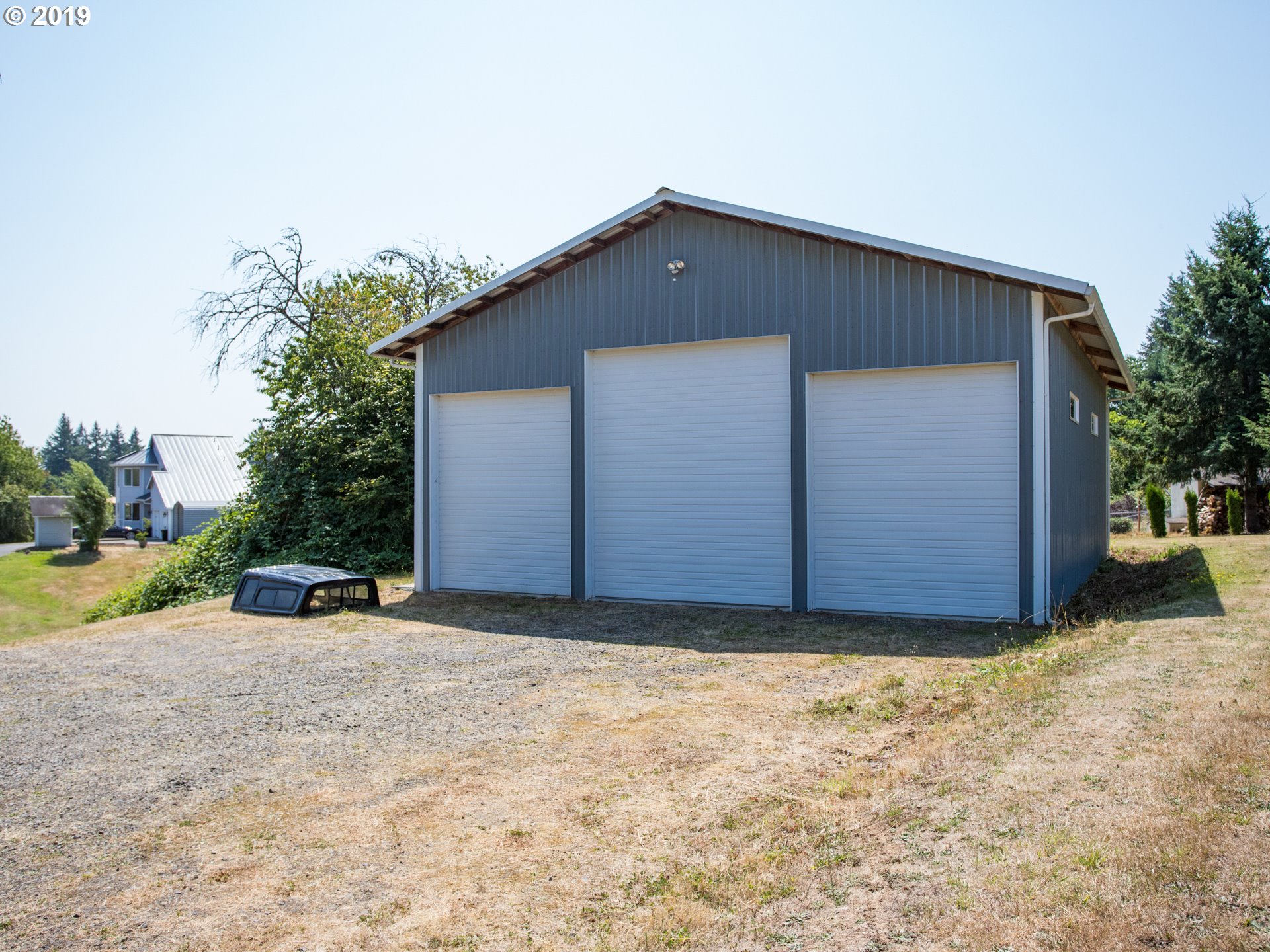 417 Northeast 299th Street Ridgefield, WA 98642 - Photo 9 of 32 a view of a backyard of a house