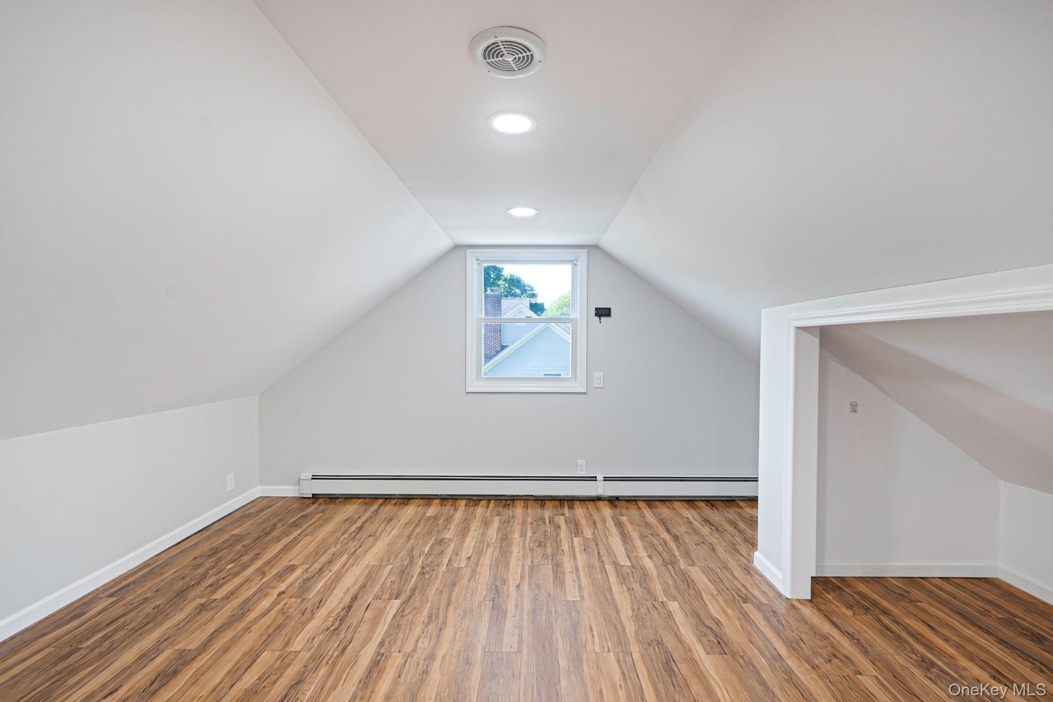 16 Valentine Road Shoreham, NY 11786 - Photo 23 of 41 Second floor bedroom, recessed lighting, mainate floor