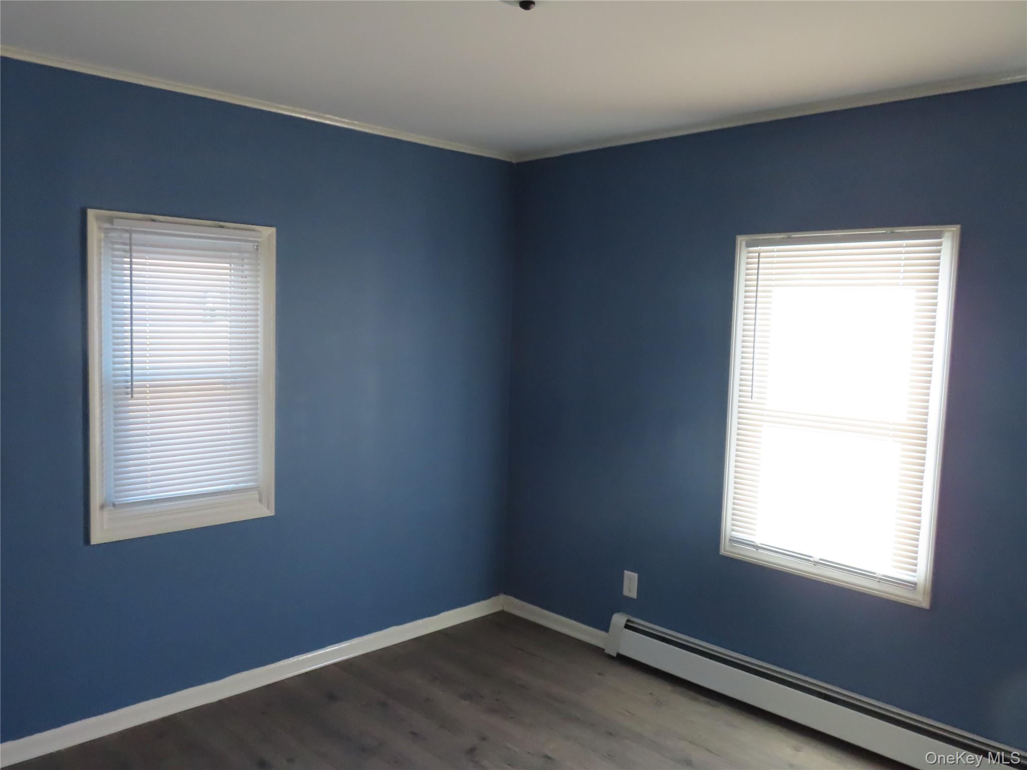 44 Terry Street Patchogue, NY 11772 - Photo 11 of 15 an empty room with a window