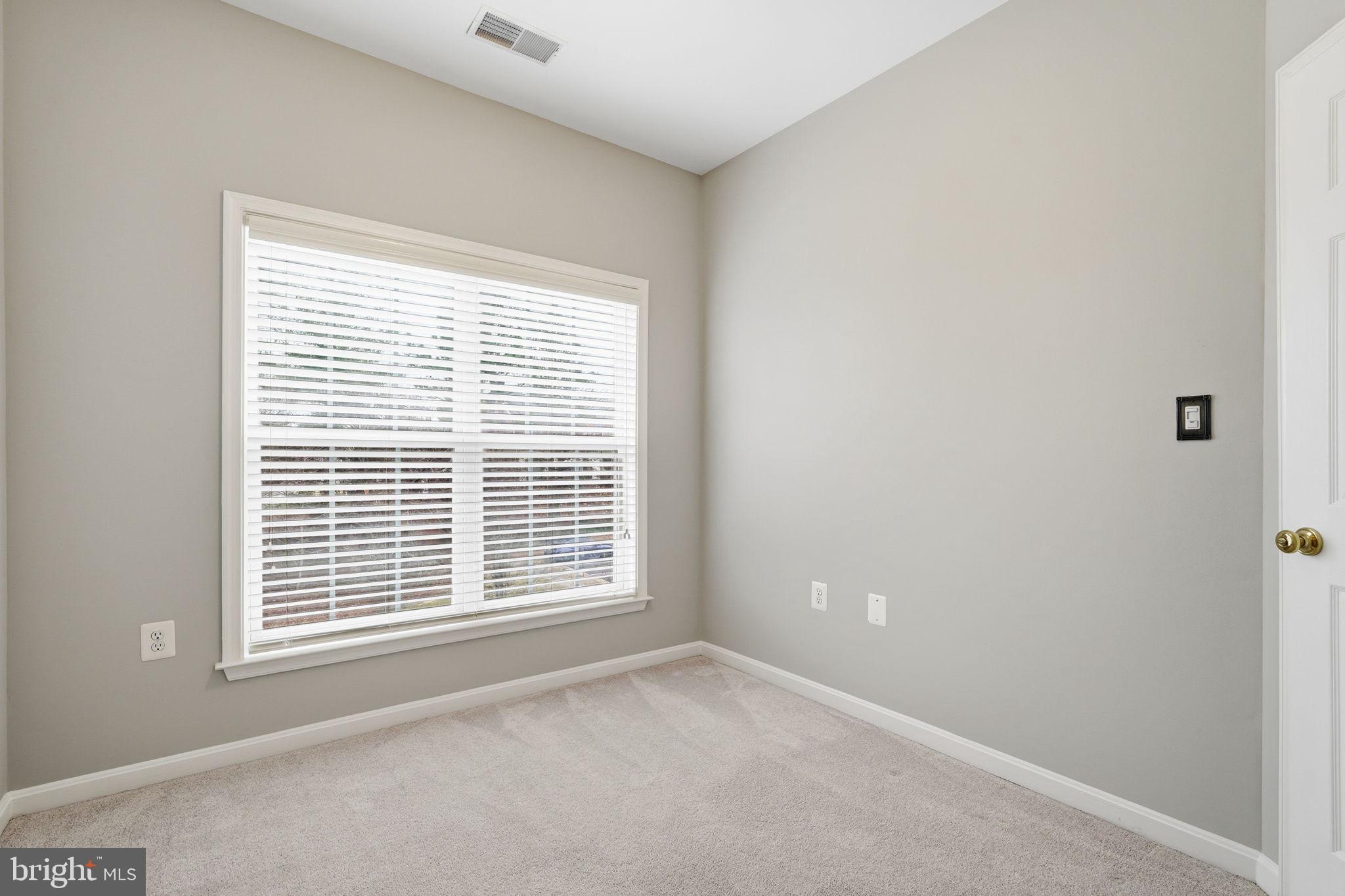 46600 Chase View Terrace Sterling, VA 20164 - Photo 24 of 38 a view of an empty room with a window