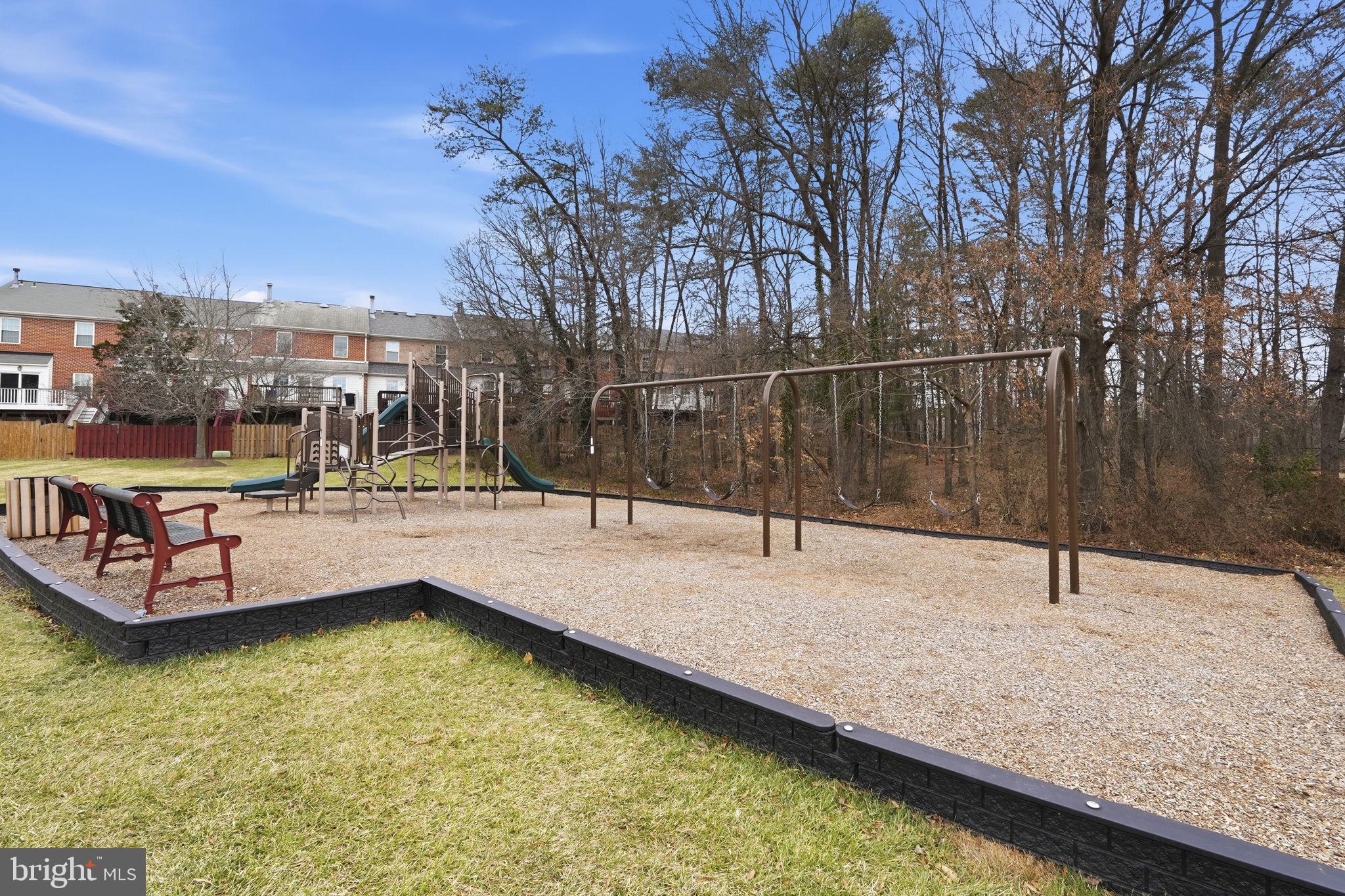 46600 Chase View Terrace Sterling, VA 20164 - Photo 38 of 38 a view of a swimming pool with a patio and a yard