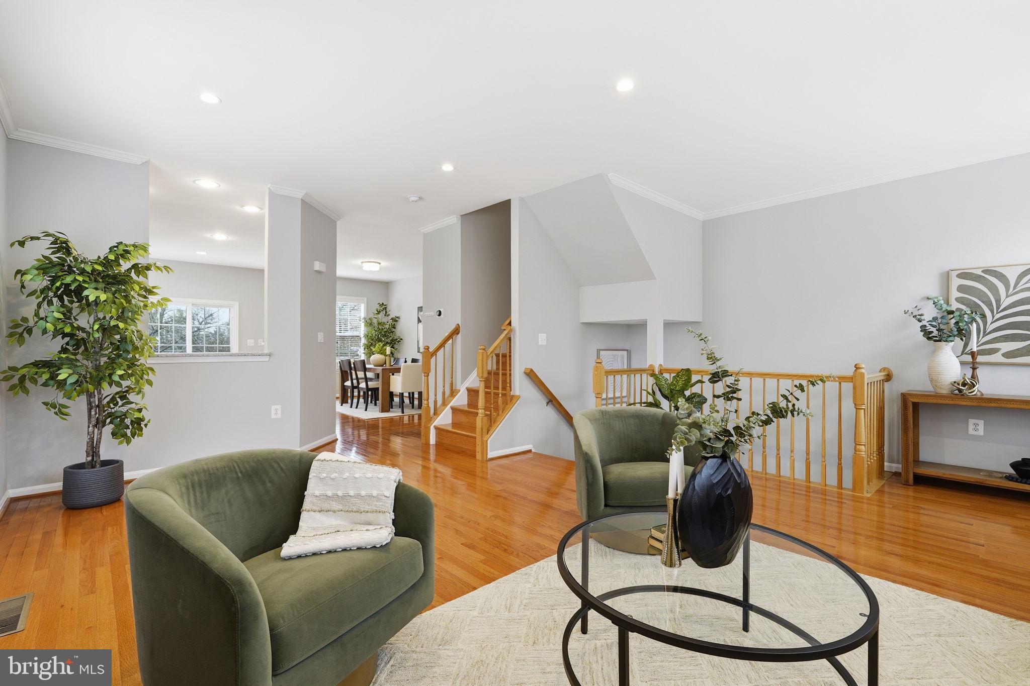 46600 Chase View Terrace Sterling, VA 20164 - Photo 5 of 38 a living room with furniture and a wooden floor
