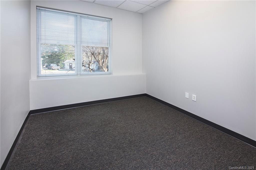 442 South Main Street, Unit 24 Davidson, NC 28036 - Photo 11 of 25 an empty room with a window