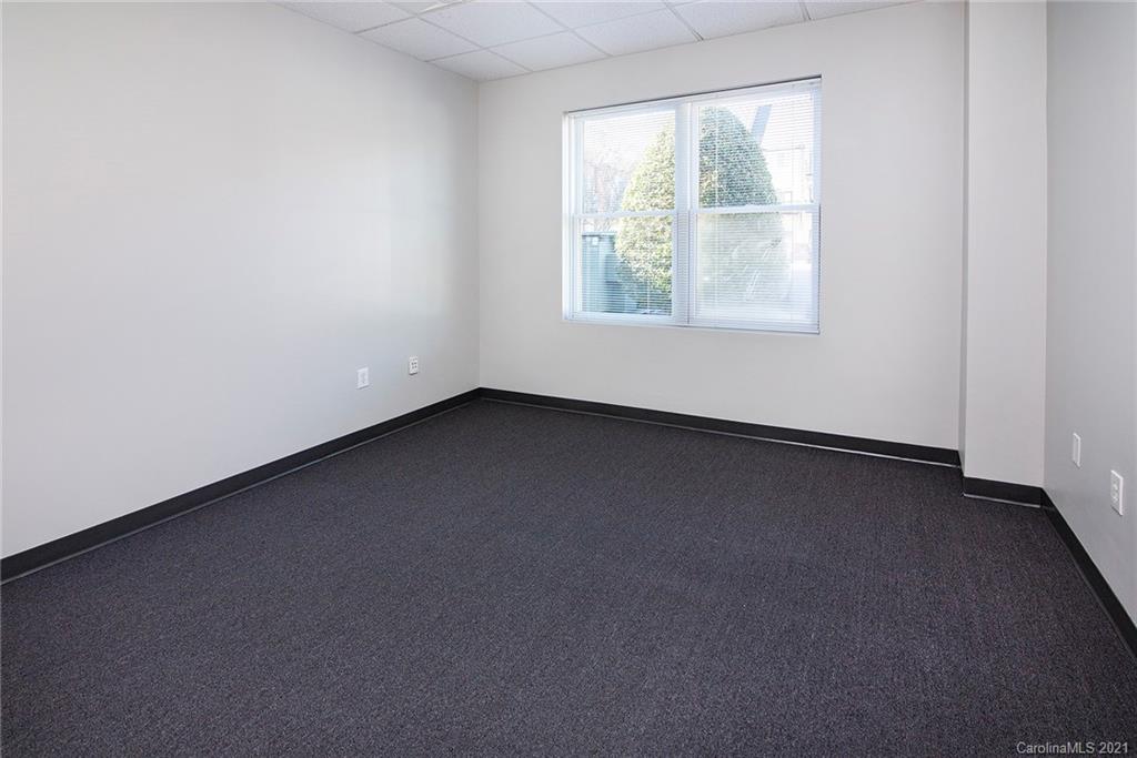 442 South Main Street, Unit 24 Davidson, NC 28036 - Photo 16 of 25 an empty room with a window