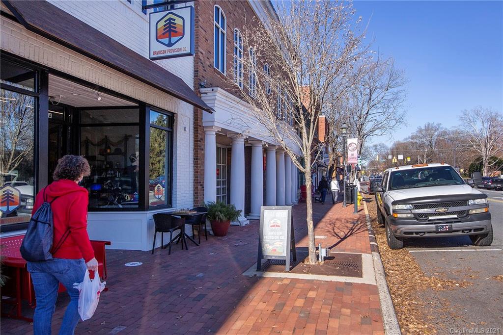 442 South Main Street, Unit 24 Davidson, NC 28036 - Photo 23 of 25 a view of a chairs and table in the patio