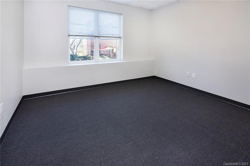 442 South Main Street, Unit 24 Davidson, NC 28036 - Photo 8 of 25 an empty room with a window
