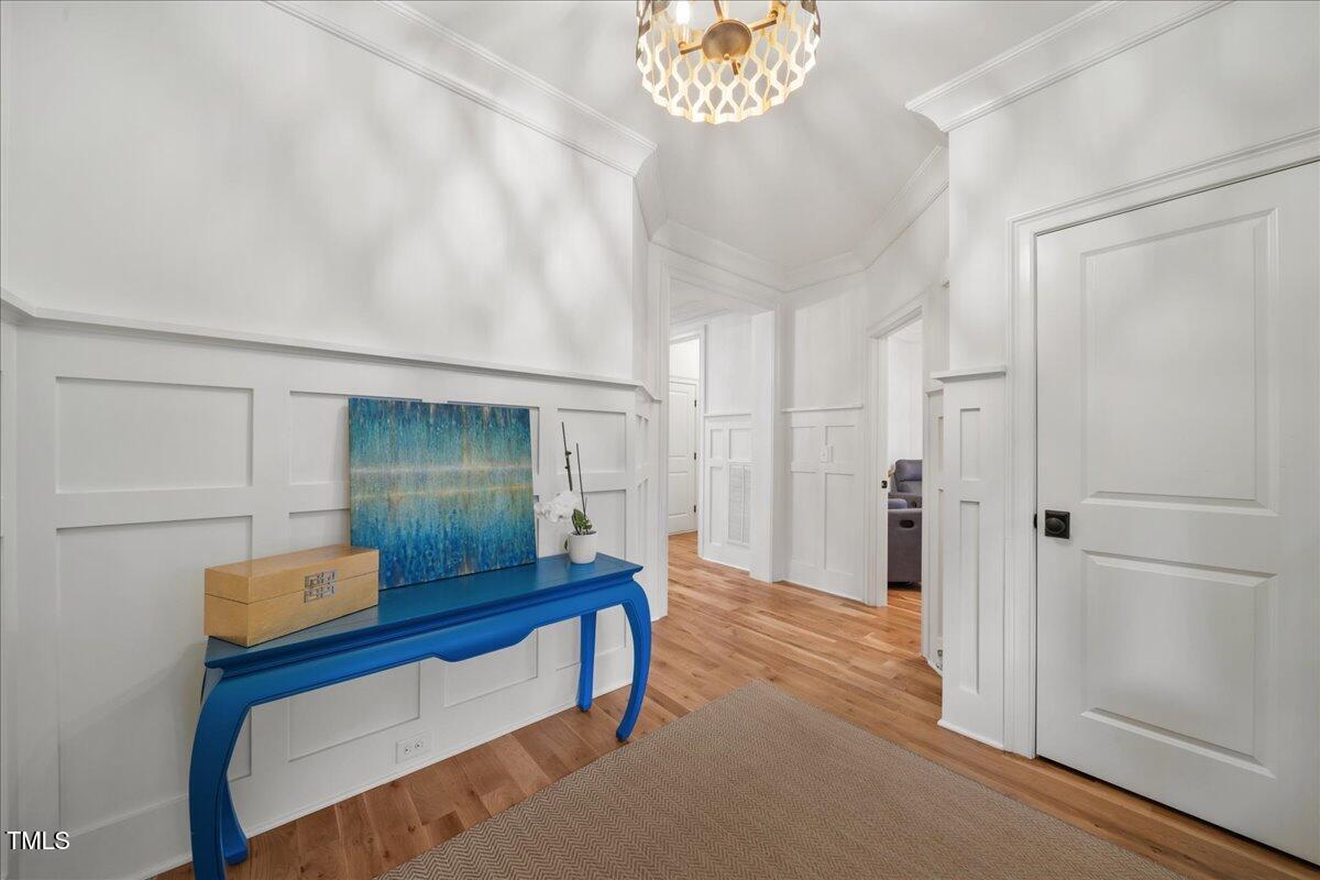 2926 Barmettler Street Raleigh, NC 27607 - Photo 20 of 74 a view of room with furniture and wooden floor