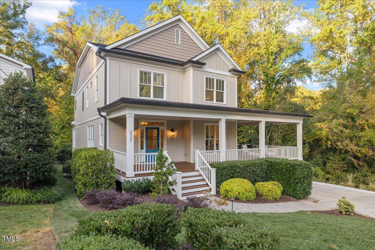 2926 Barmettler Street Raleigh, NC 27607 - Photo 2 of 74 a front view of a house with garden