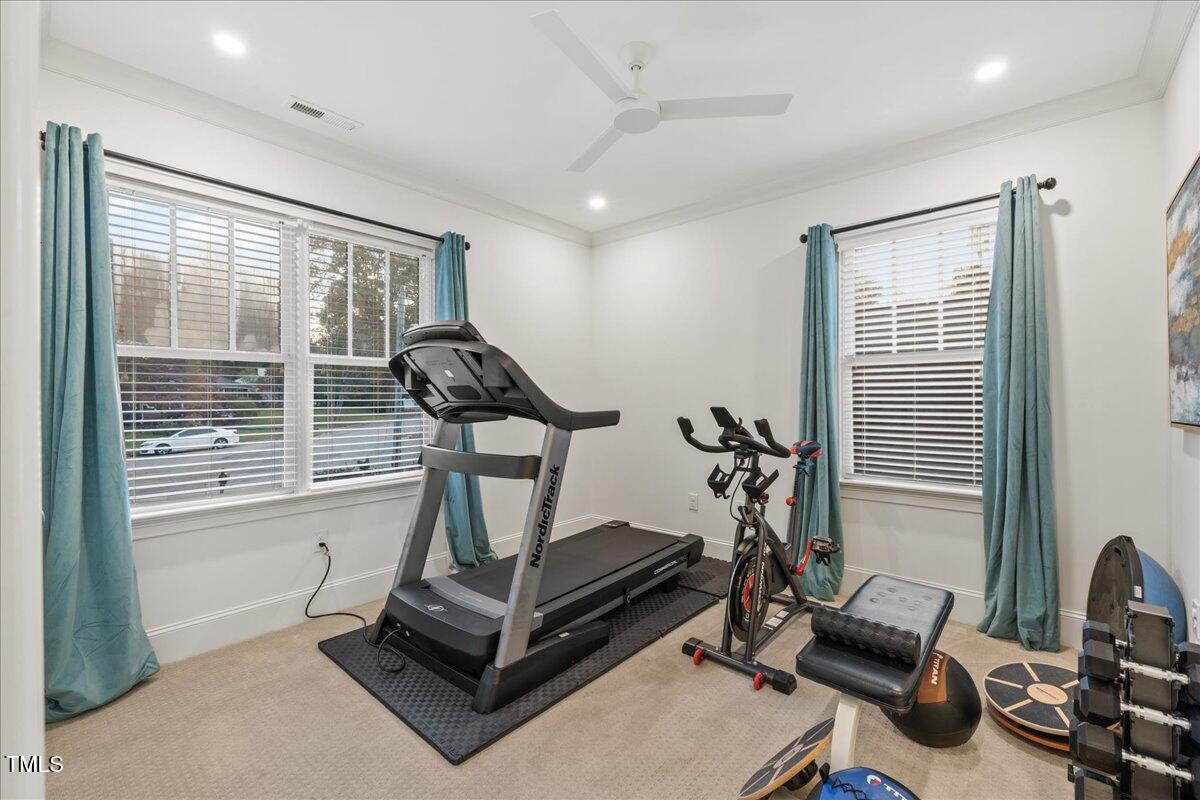 2926 Barmettler Street Raleigh, NC 27607 - Photo 34 of 74 a view of a room with gym equipment