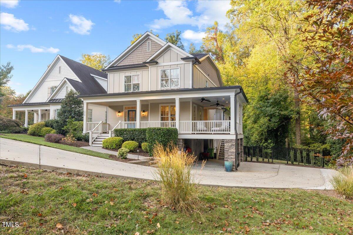 2926 Barmettler Street Raleigh, NC 27607 - Photo 4 of 74 a front view of a house with garden and porch