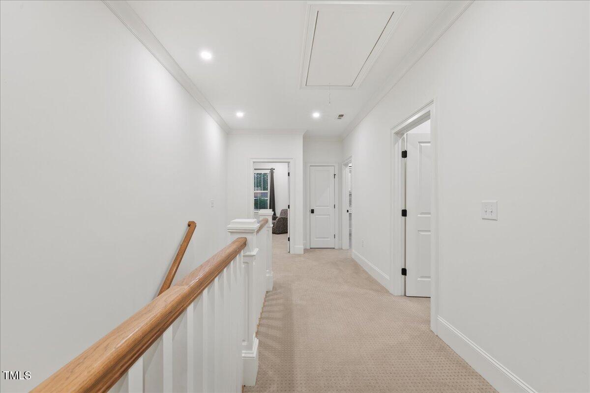 2926 Barmettler Street Raleigh, NC 27607 - Photo 43 of 74 a view of a hallway with staircase