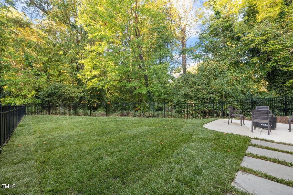 2926 Barmettler Street Raleigh, NC 27607 - Photo 66 of 74 a view of a backyard with a small park