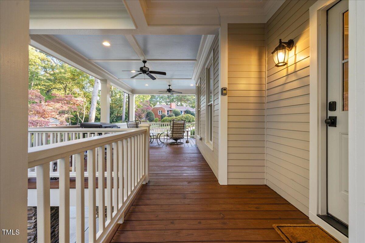 2926 Barmettler Street Raleigh, NC 27607 - Photo 68 of 74 a view of a porch with wooden floor