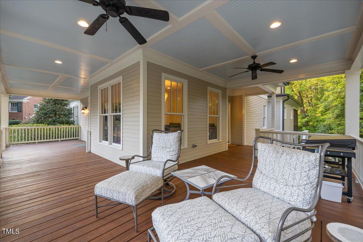 2926 Barmettler Street Raleigh, NC 27607 - Photo 7 of 74 a living room with furniture and a large window